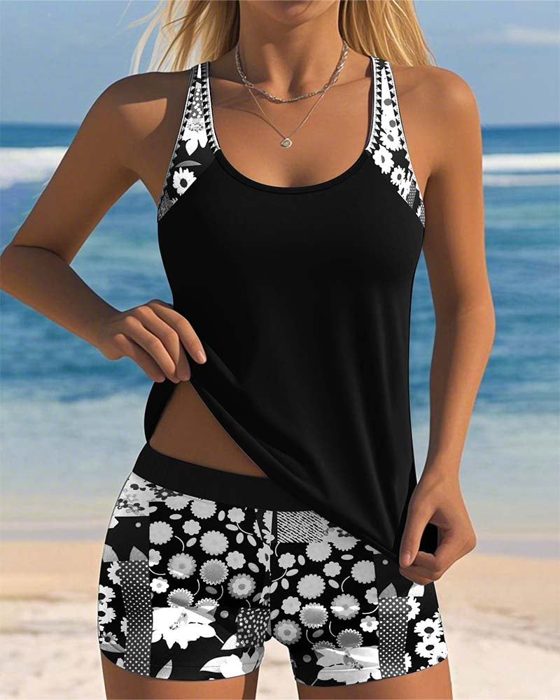Complete women's floral tankini set, including flowy top and practical swim shorts for beach activities.