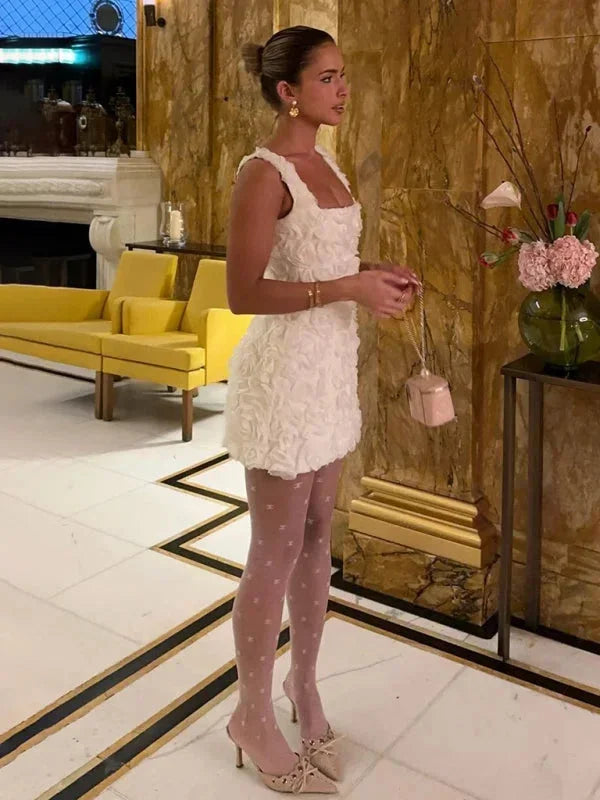 Chic women's party dress, a floral textured mini for cocktails, weddings, or special occasions.