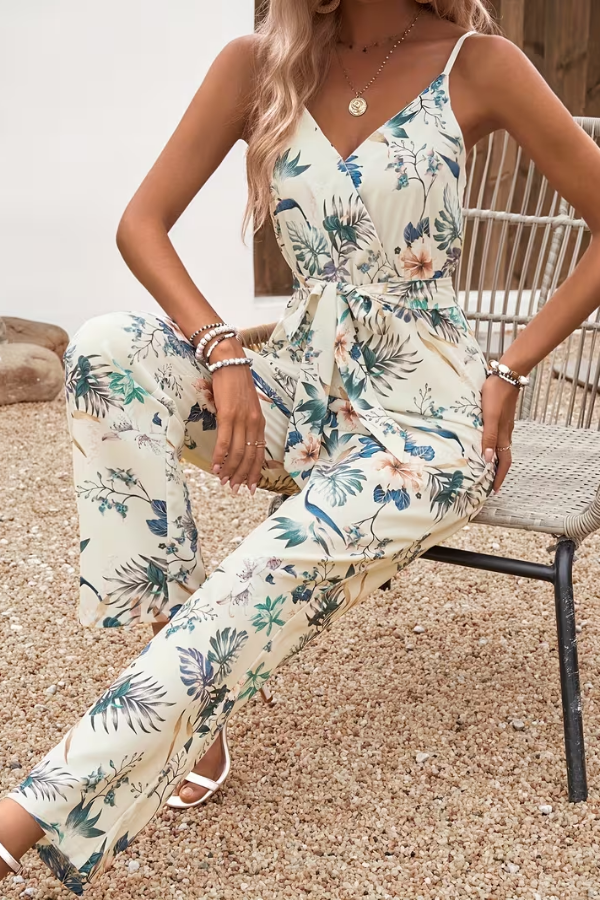 Stylish women's floral print cami jumpsuit with tie waist. Ideal for summer fashion, casual outings & vacation.
