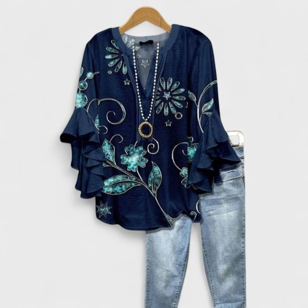 Women's vintage floral V-neck blouse with sophisticated ruffle sleeves, a versatile piece for spring and summer fashion.