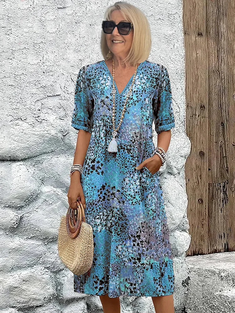Comfortable women's casual floral V-neck midi dress, ideal for effortless everyday wear & summer style.