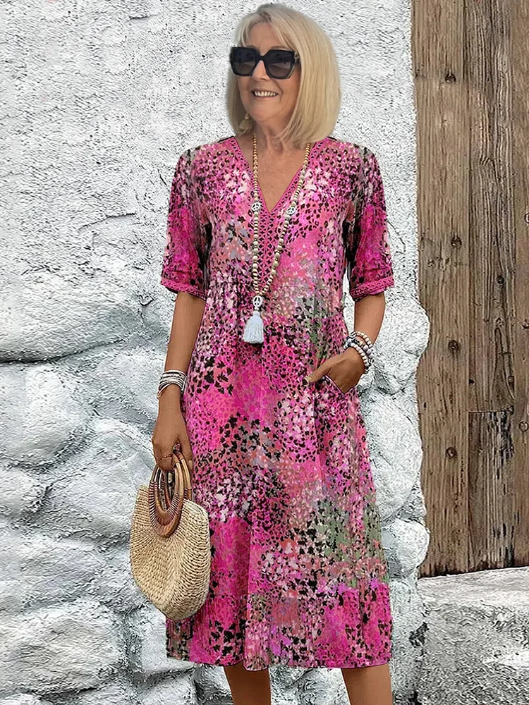 Elegant A-line floral midi dress for women, designed with a chic V-neck, suitable for various occasions.