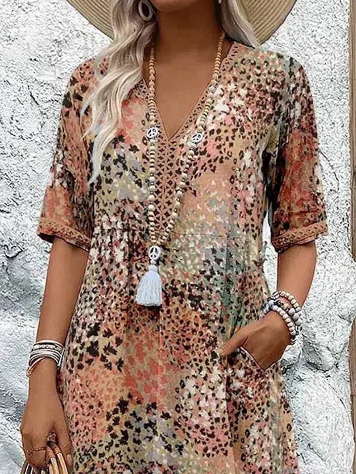 Flowy A-line women's floral printed midi dress with a stylish V-neck, perfect for spring & summer.