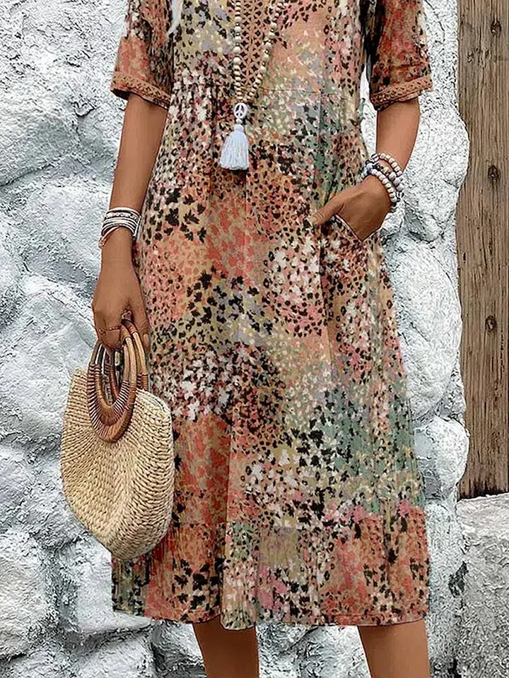 Fashionable women's V-neck floral midi dress, a comfortable & chic A-line design for any casual outing.