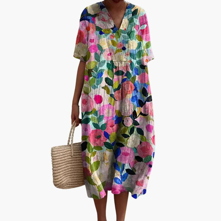 Stylish plus size women's floral midi dress, V-neck, short sleeves, flattering flowy oversized fit.