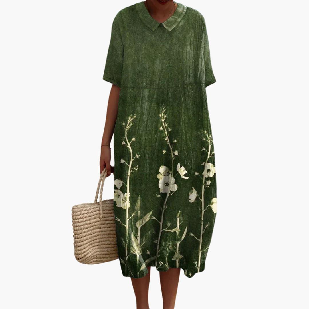 Relaxed fit floral midi dress for women, featuring a flattering V-neck and comfy pockets.