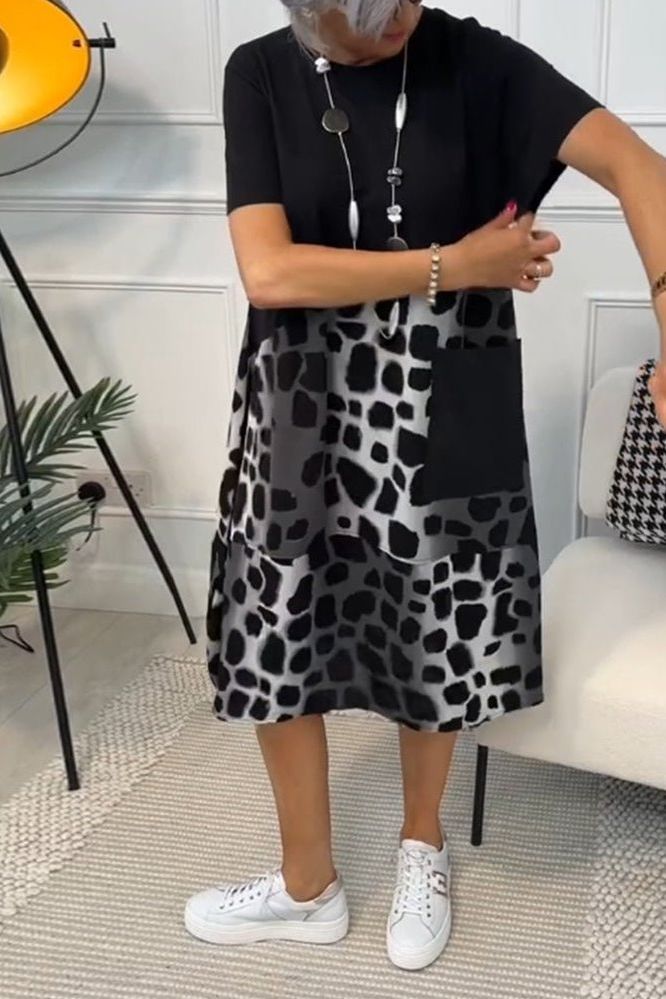 Elegant Black Floral Waist-Defined Midi Dress for women, perfect for summer casual or dressy looks.