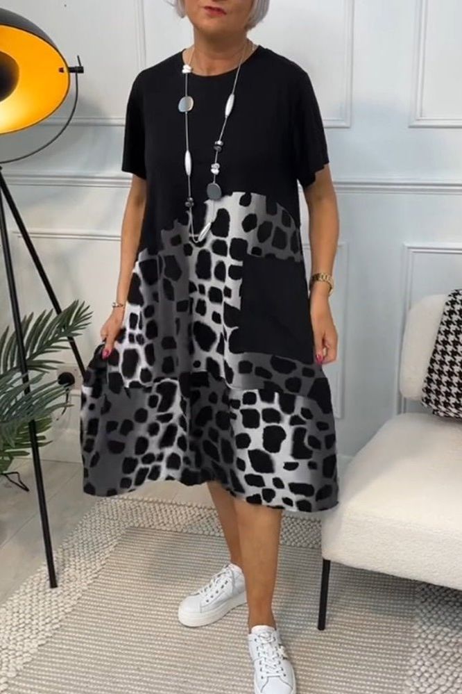 Flattering Women's Floral Midi Dress with a waist-defined silhouette, ideal for summer elegance.