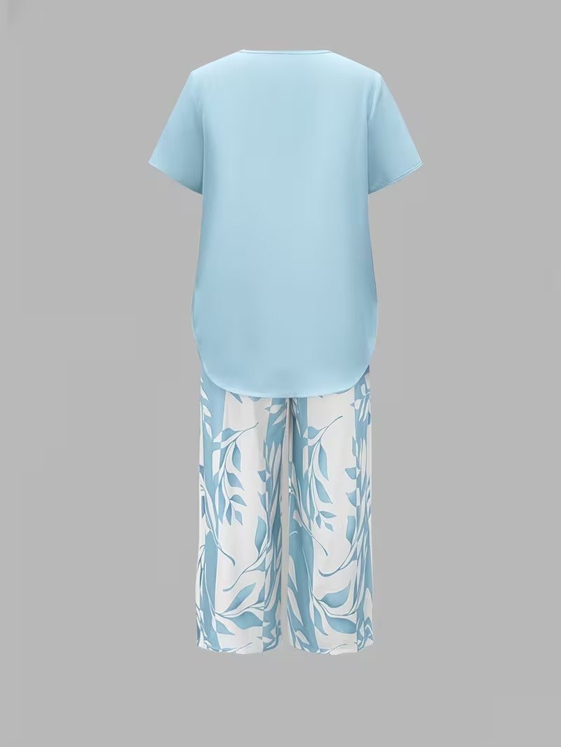 Women's comfortable floral wide leg V-neck two-piece set, perfect for a stylish summer vacation.