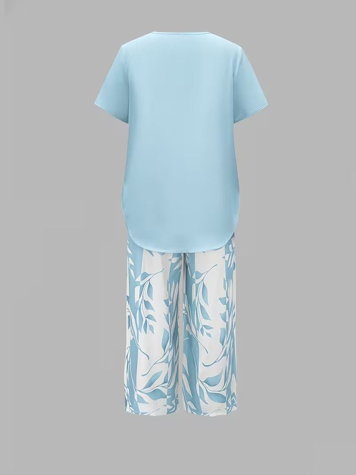 Women's comfortable floral wide leg V-neck two-piece set, perfect for a stylish summer vacation.