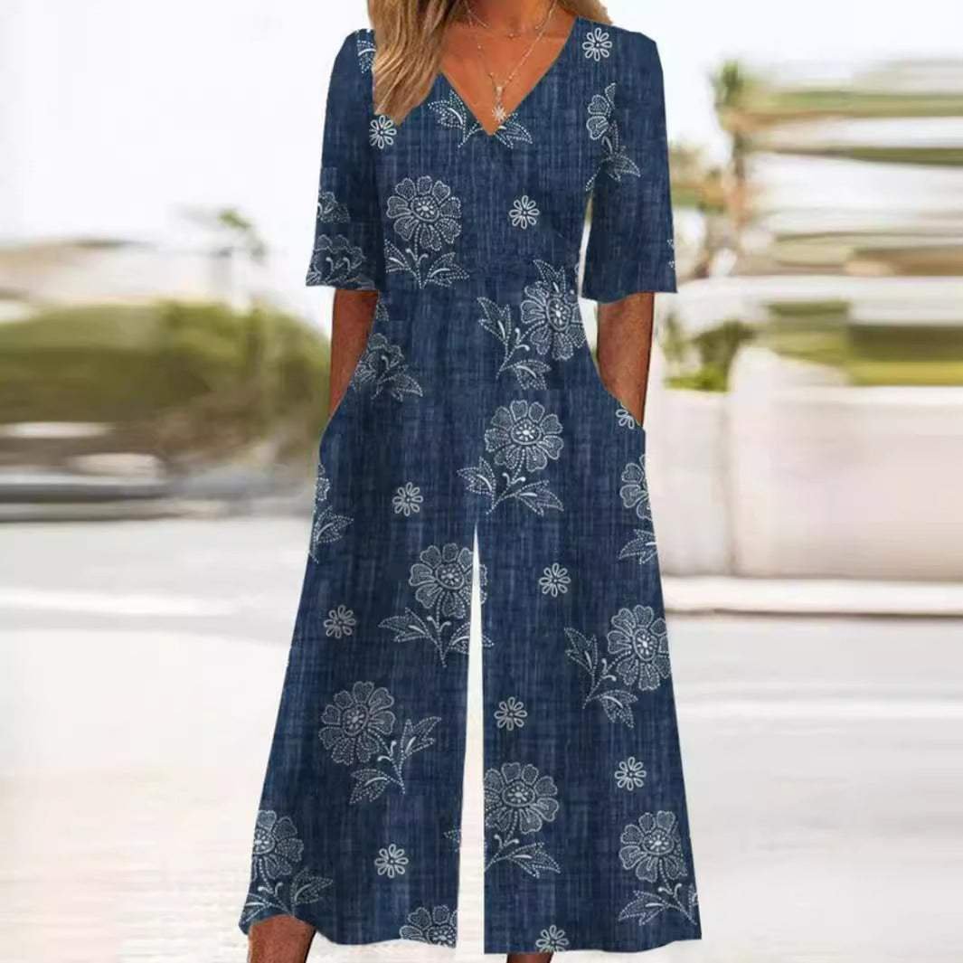 Women's floral wide-leg jumpsuit with V-neck & elbow sleeves. Bohemian palazzo style, perfect for summer casual wear.