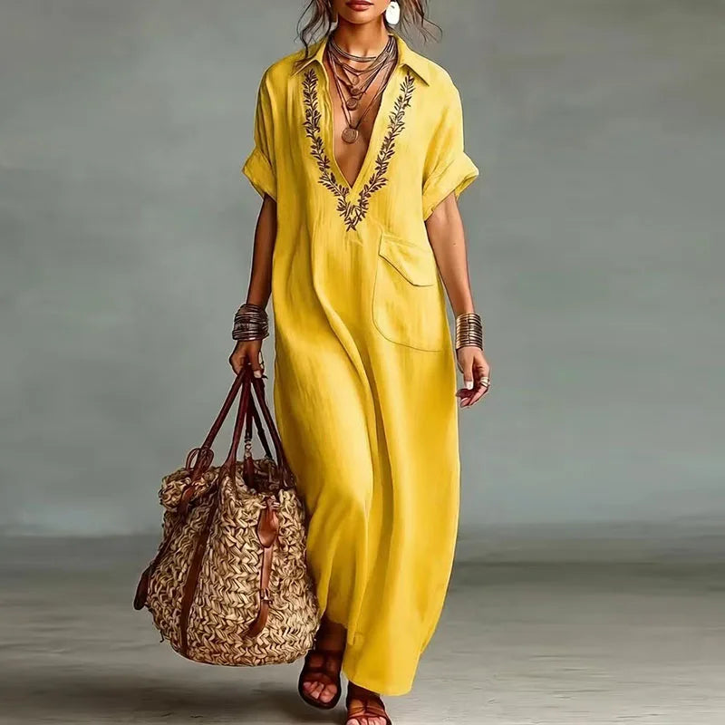 Casual women's bohemian V-neck maxi dress, ideal for summer, beachwear, or comfortable vacation attire.