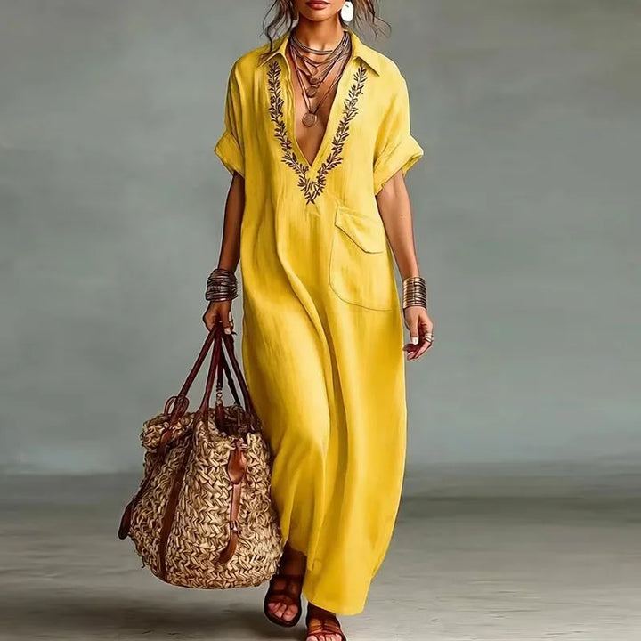 Casual women's bohemian V-neck maxi dress, ideal for summer, beachwear, or comfortable vacation attire.