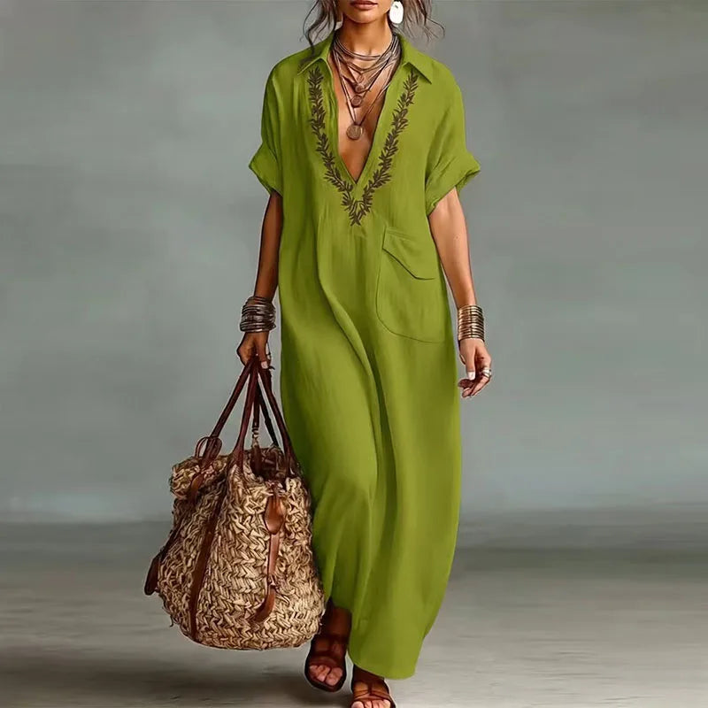 Flattering women's bohemian V-neck maxi dress, flowy and printed, perfect for summer casual or elegant wear.