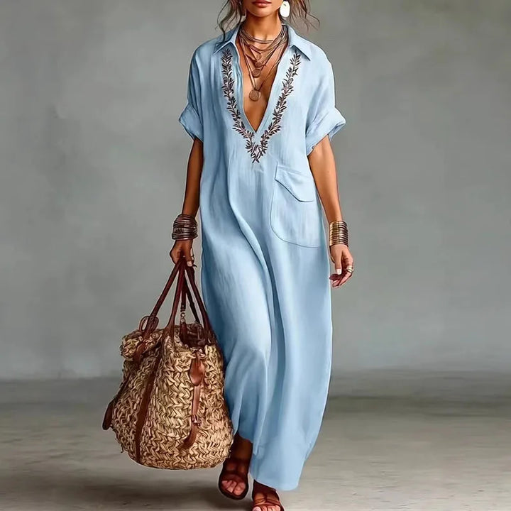 Bohemian V-neck maxi dress for women, flowy printed design, ideal for summer, beach, or casual outings.