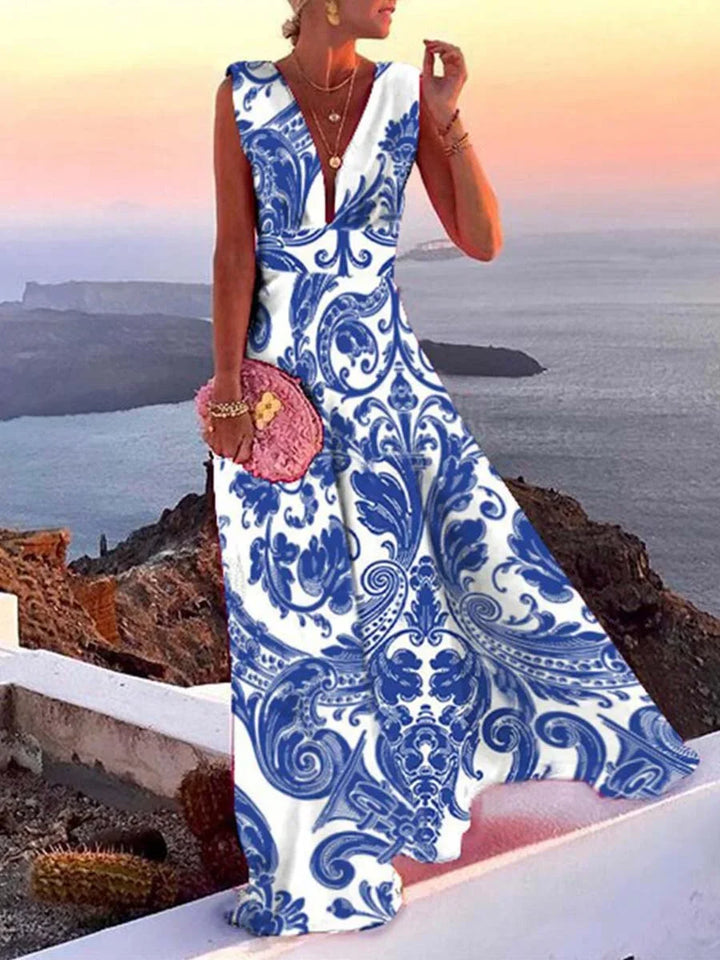 Women's fashion deep V-neck sleeveless maxi dress, a flowy summer essential for elegant parties & vacation.
