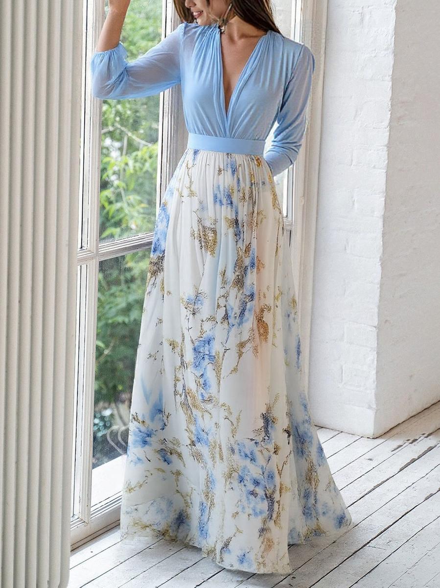 Stylish women's summer V-neck maxi dress with a vibrant floral pattern and flowing, comfortable fit.
