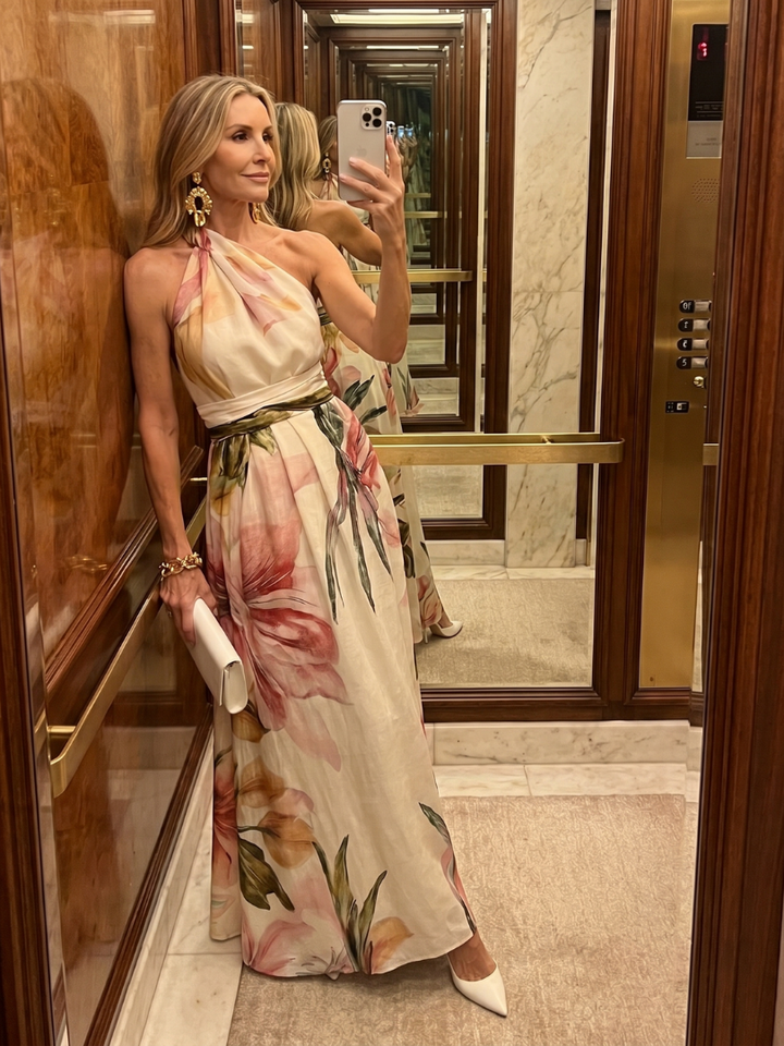 Casual chic women's flowing halter maxi dress. Sleeveless, comfortable, and perfect for warm summer days.