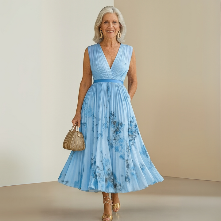 Feminine women's sleeveless maxi dress with a flattering v-neck, versatile for casual day or elegant evening.