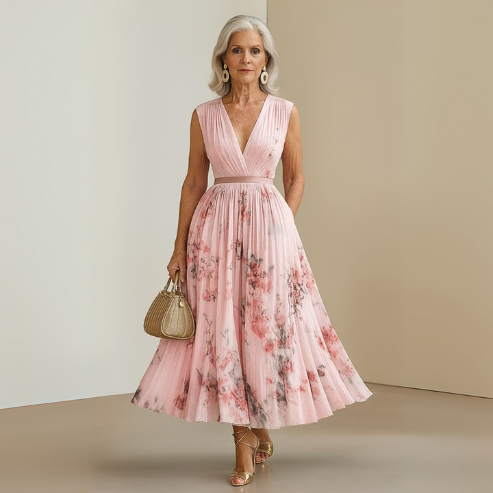 Bohemian style women's flowy maxi dress, sleeveless, v-neck, ideal for beach, resort, or casual outings.