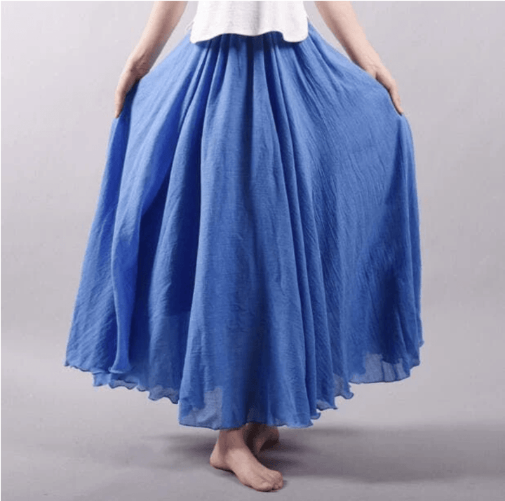 Elegant women's flowy maxi skirt, comfortable A-line silhouette, ideal for summer beachwear & resort.