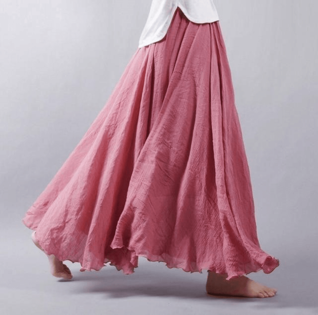 Casual women's flowy A-line maxi skirt, comfortable beach resort wear, perfect for summer vacation.