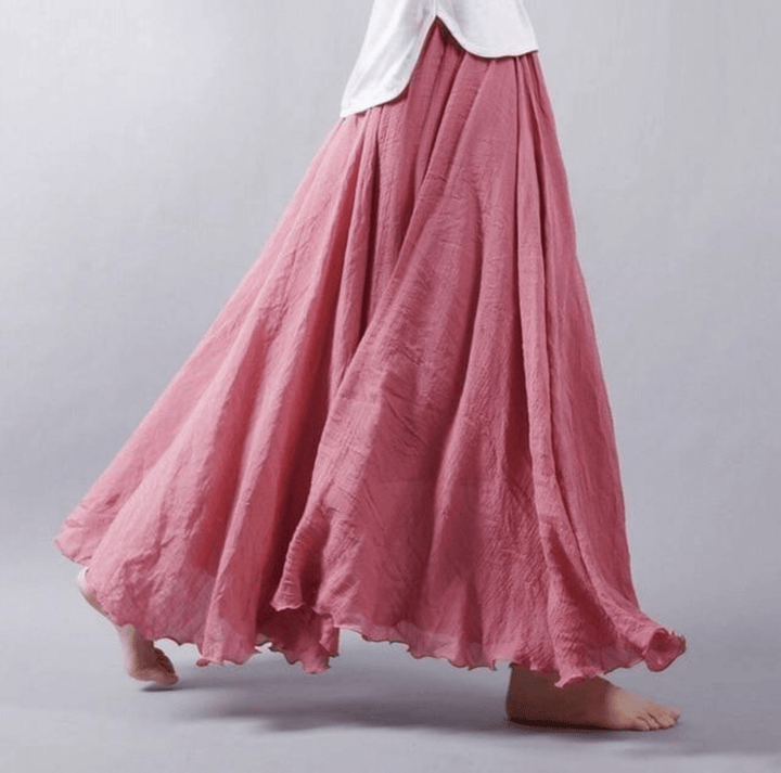 Casual women's flowy A-line maxi skirt, comfortable beach resort wear, perfect for summer vacation.