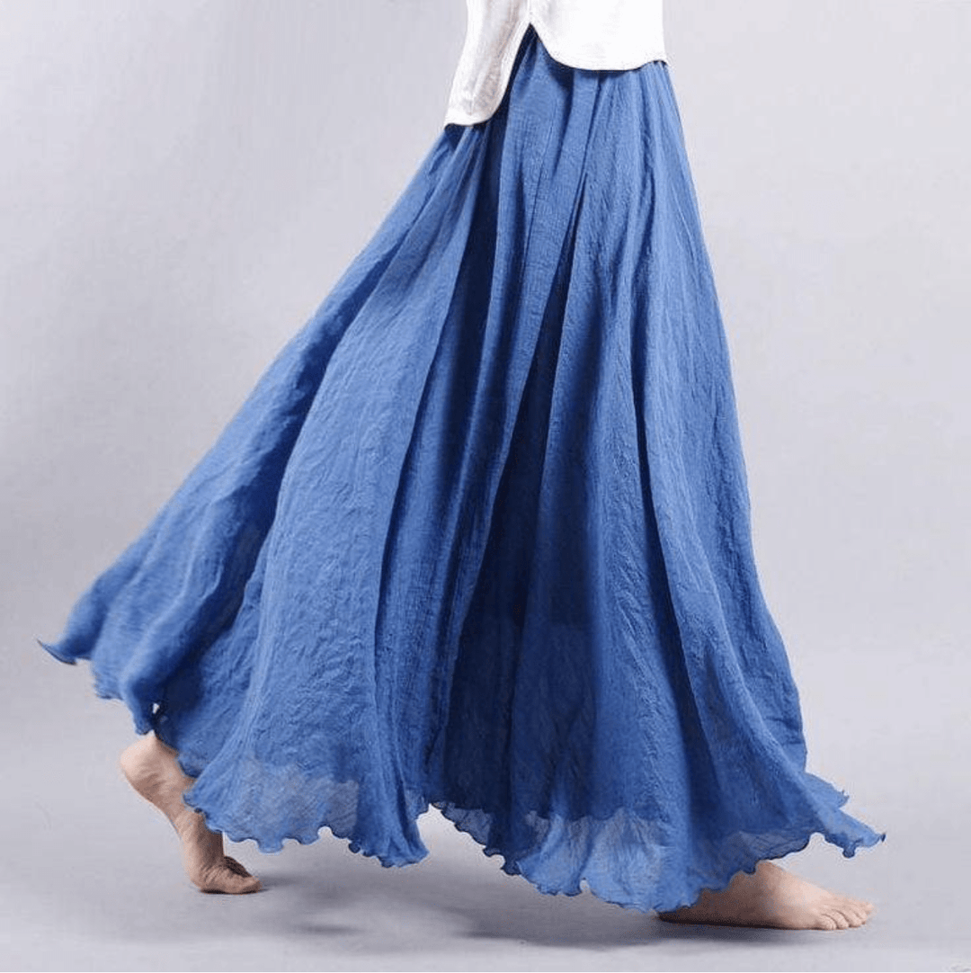 Stylish women's flowy A-line maxi skirt, versatile for casual summer fashion, beach trips, or resort wear.