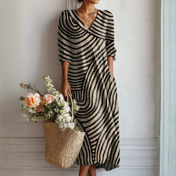 Women's flowy abstract wave print V-neck maxi dress with long sleeves, perfect for casual summer & spring boho fashion.