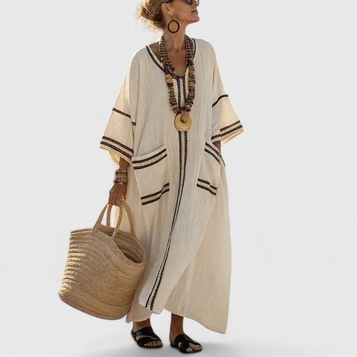Effortless style flowy maxi dress for women, featuring a bohemian design and pockets.
