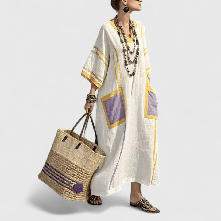 Women's summer bohemian maxi dress with a relaxed fit and convenient side pockets.