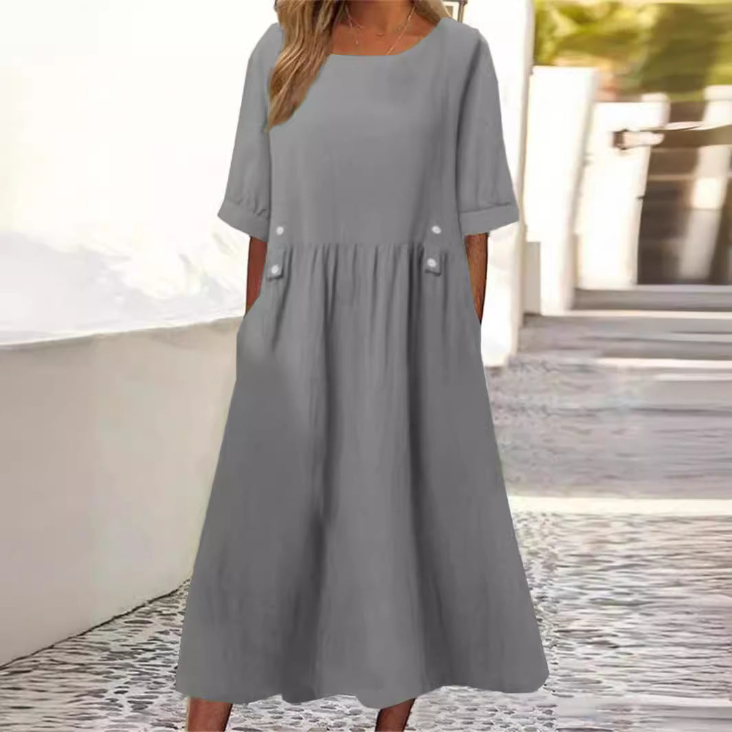 Elegant women's midi dress with a round neck & flowy silhouette, ideal for summer vacations & casual wear.