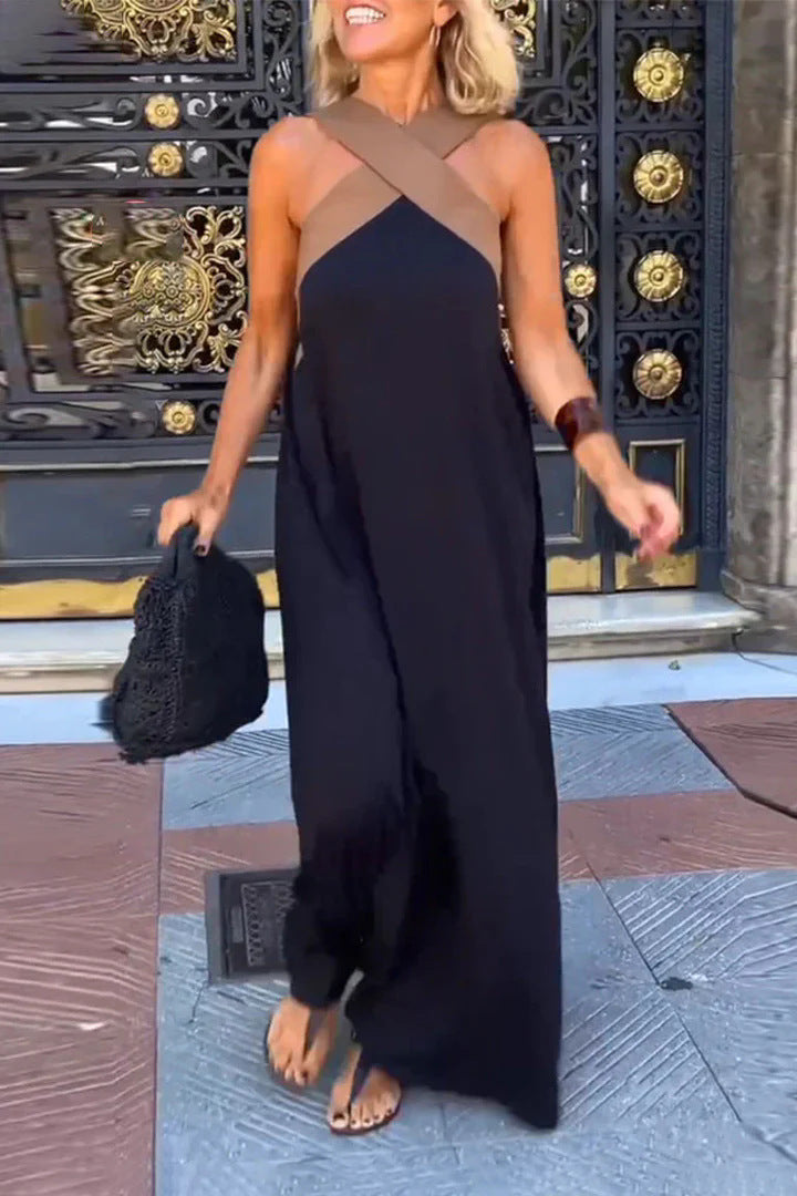 Women's flowy cross neck maxi dress, versatile for evening and day wear.