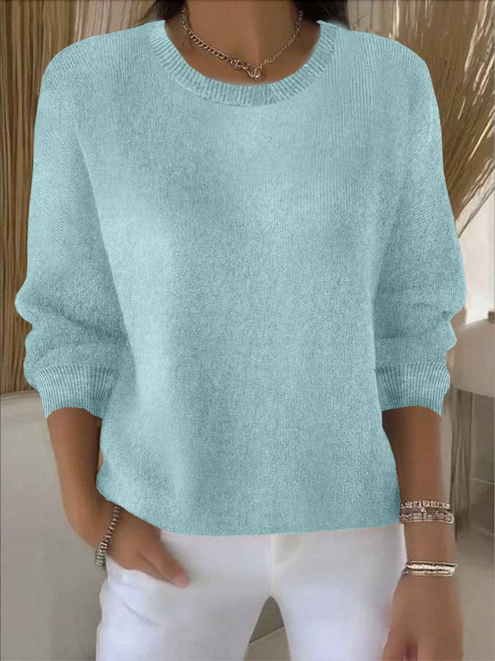 Women's flowy long sleeve sweater, excellent for comfortable and stylish layering. Versatile pullover.