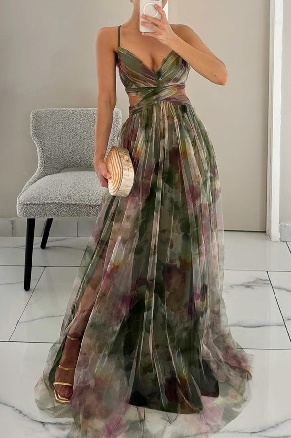 Women's vacation-ready floral maxi dress. Flowy design with elegant orange & green print.