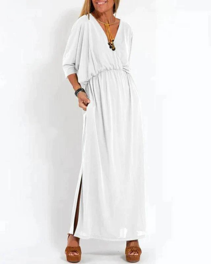 Casual flowy long dress for women, featuring adjustable straps, ideal for beachwear or everyday comfort.