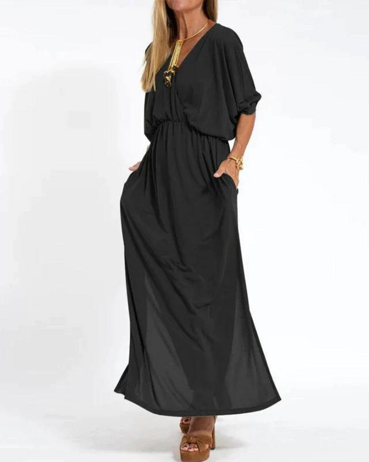 Stylish women's midi dress with adjustable straps, a comfortable and versatile flowy summer fashion piece.