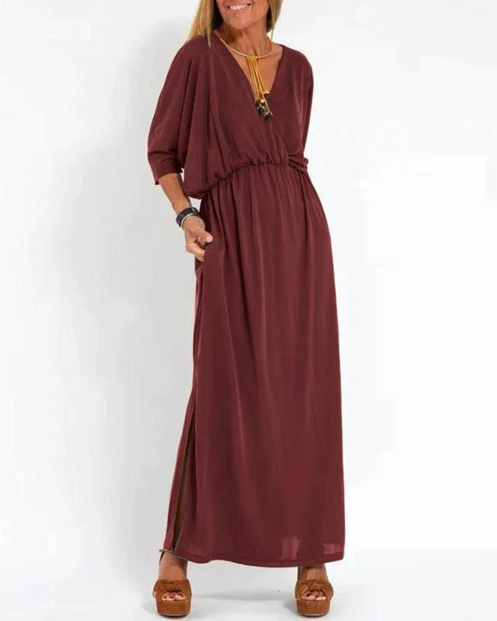Breathable women's summer flowy dress, a comfortable long midi with adjustable straps for casual or elegant wear.