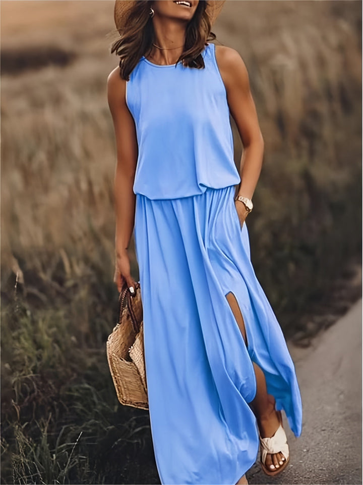 Comfortable sleeveless maxi dress for women, featuring a flattering flowy design & practical pockets.