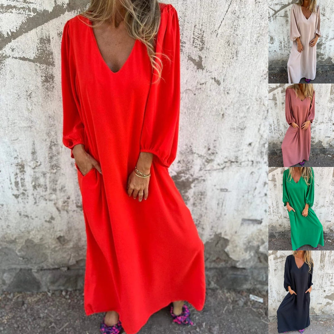 Versatile long flowy dress for women, showcasing a V-neck, elegant balloon sleeves, and essential pockets.