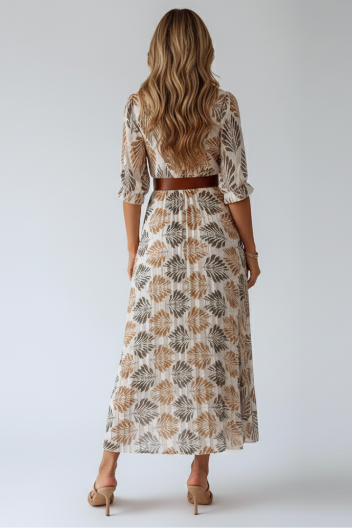 Effortless women's patterned flowy maxi dress. Elbow sleeves and comfortable design for summer & spring.