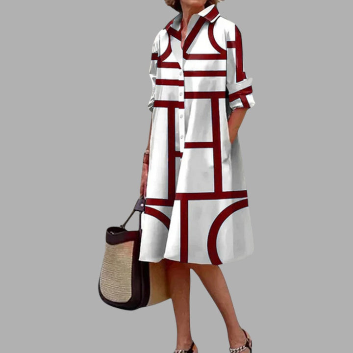 Women's flowy printed midi dress, perfect for effortless casual summer style. Comfortable and elegant everyday fashion.