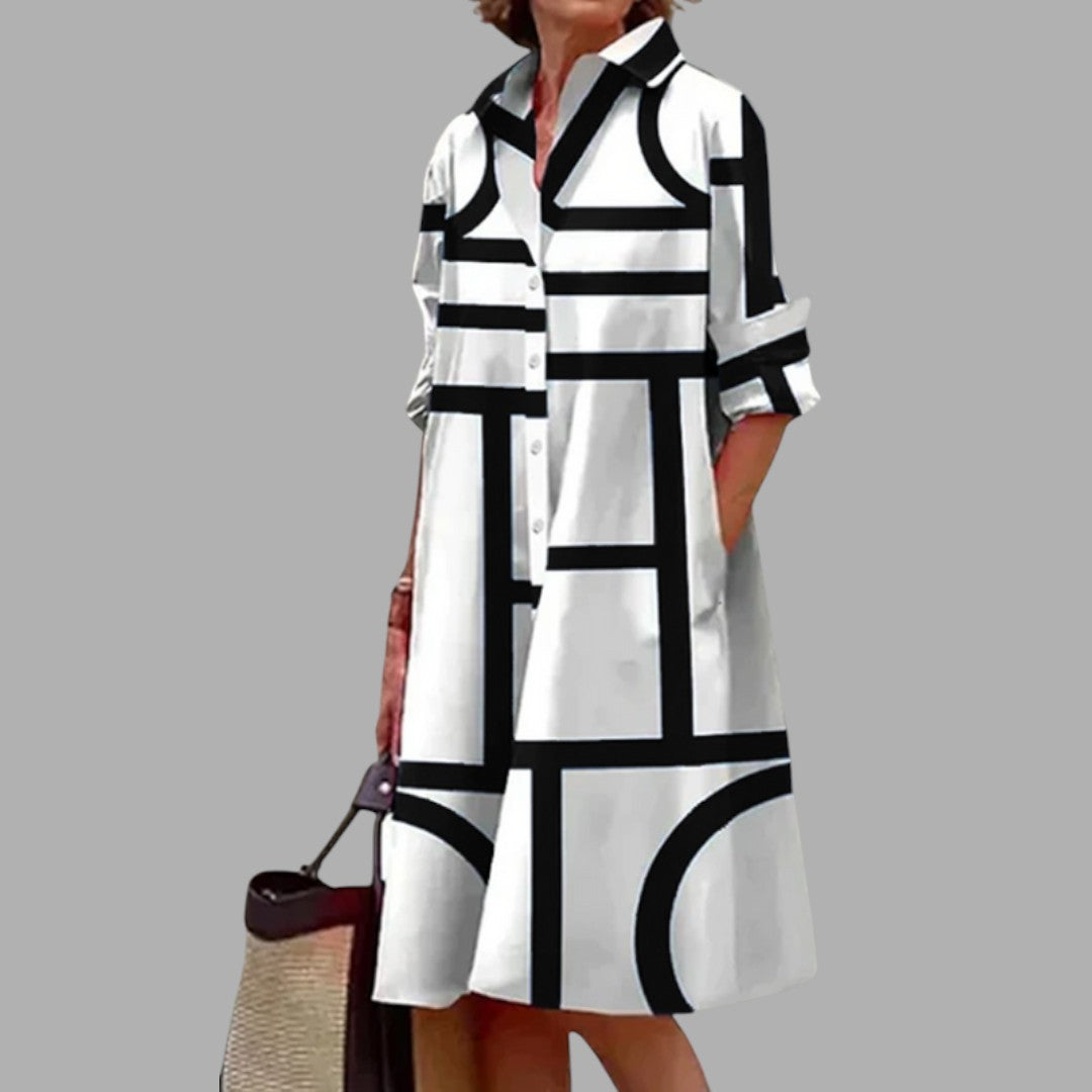 Comfortable women's printed midi dress with a flowy silhouette, ideal for casual wear or an elegant summer look.