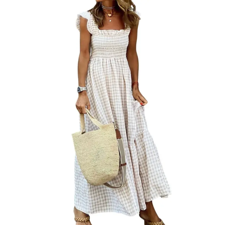 Women's flowy smocked tiered maxi dress in a vibrant red for effortless summer style & comfort.