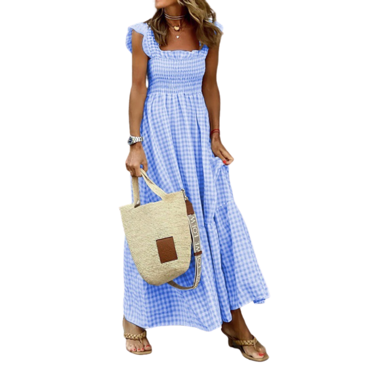 Blue smocked tiered maxi dress for women, offering a relaxed yet chic look for spring & summer fashion.
