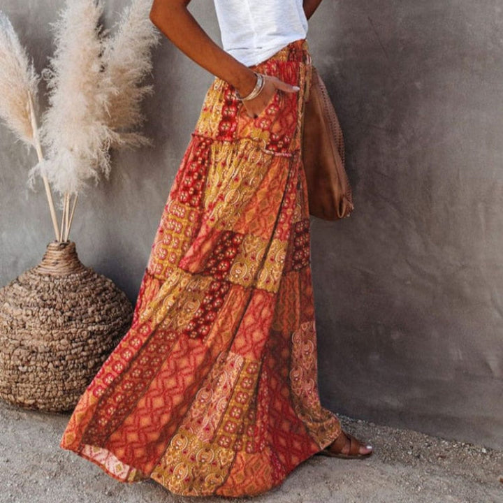 Bohemian tiered floral maxi skirt for women, high waist, essential for summer events & beach vacation.