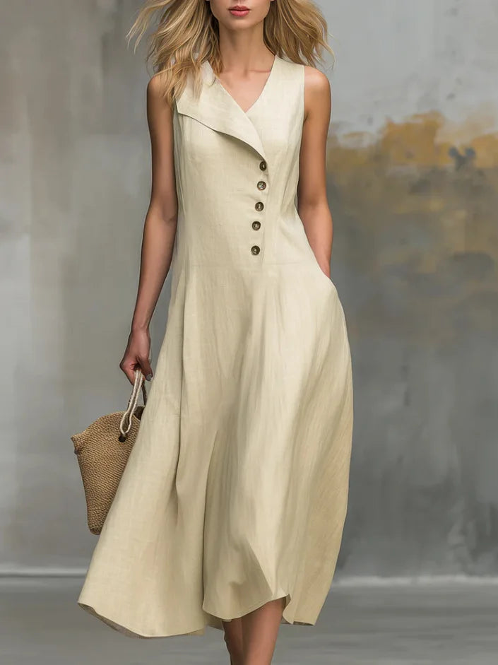 Women's flowy v-neck midi dress with stylish button details. Perfect for casual summer wear.
