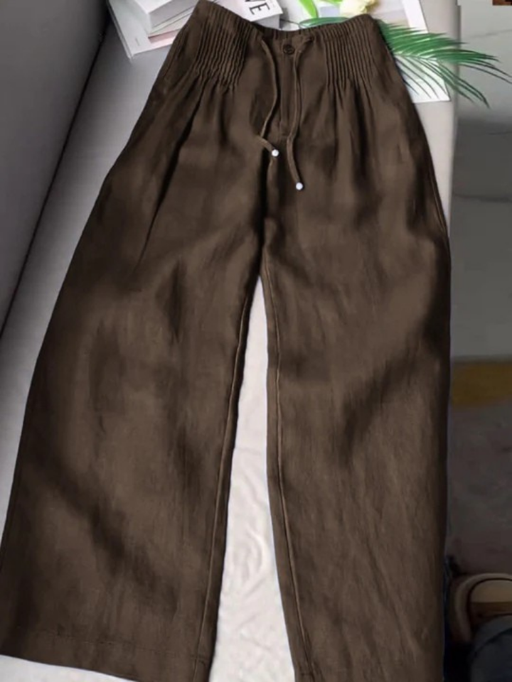 Comfortable women's wide-leg pants with elastic waist, easy to wear for all-day comfort.