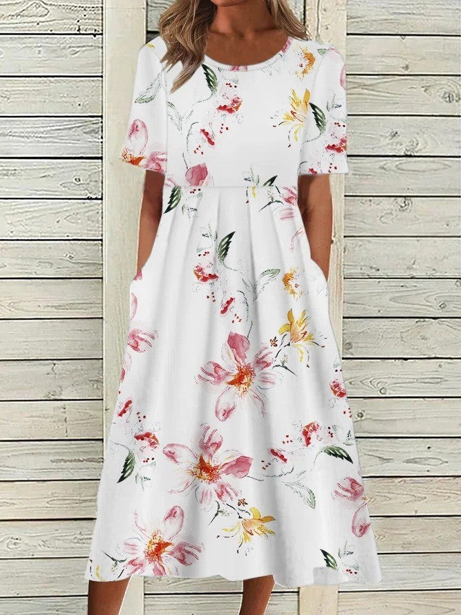 Summer-ready women's midi dress. Fresh floral A-line design, round neck, short sleeves for casual elegance.