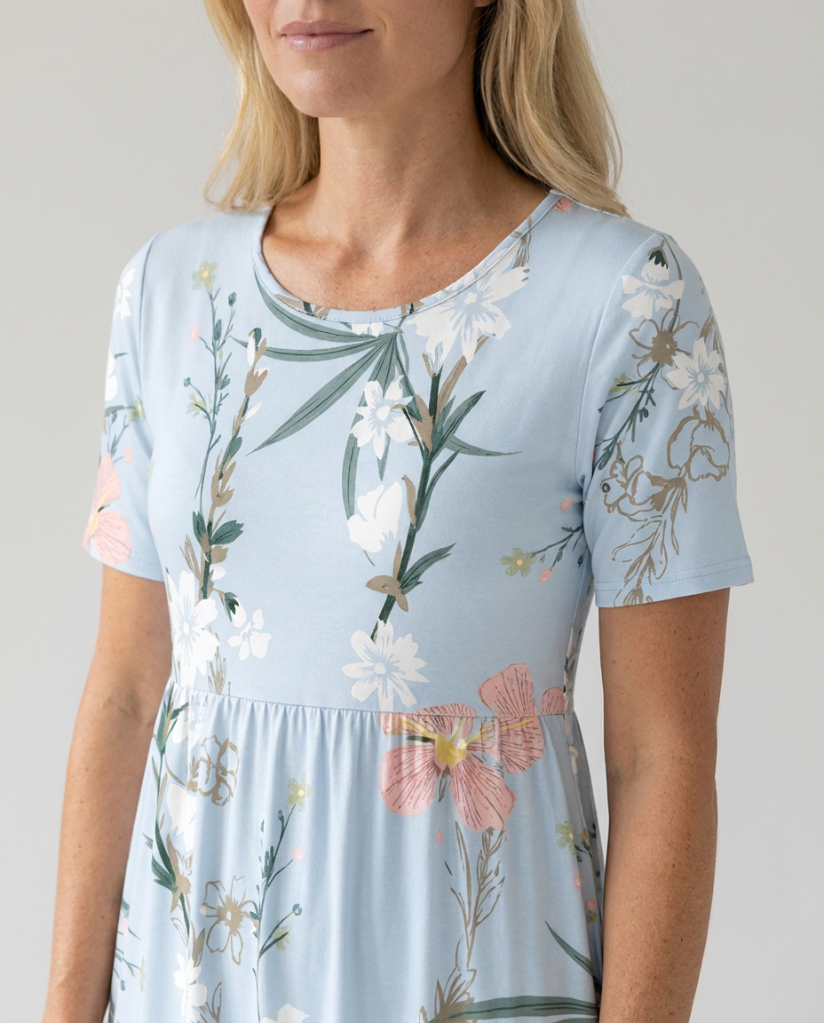 Fresh floral A-line midi dress for women. Round neck, short sleeves, great for casual or elegant summer events.